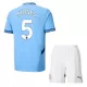 Günstige Manchester City Stones 5 Kindertrikot Heim 2024/25 Kurzarm